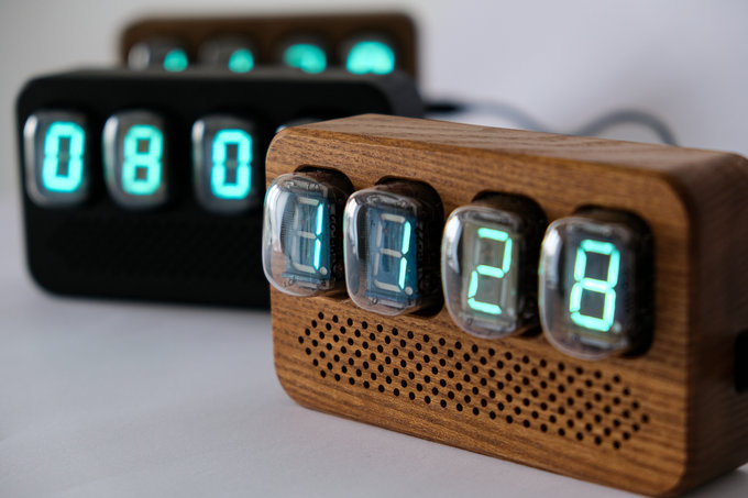 Nixie clock in wooden enclosure.